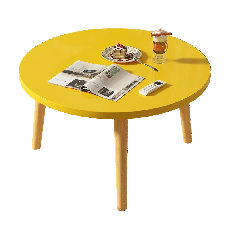 Table basse ronde en bois épurée pour petit salon
