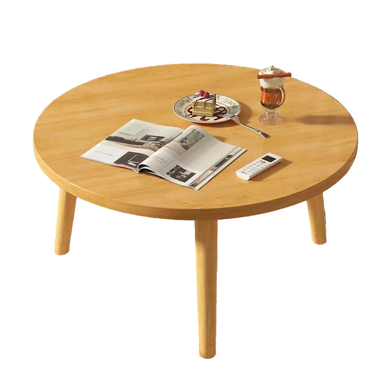 Table basse ronde en bois épurée pour petit salon