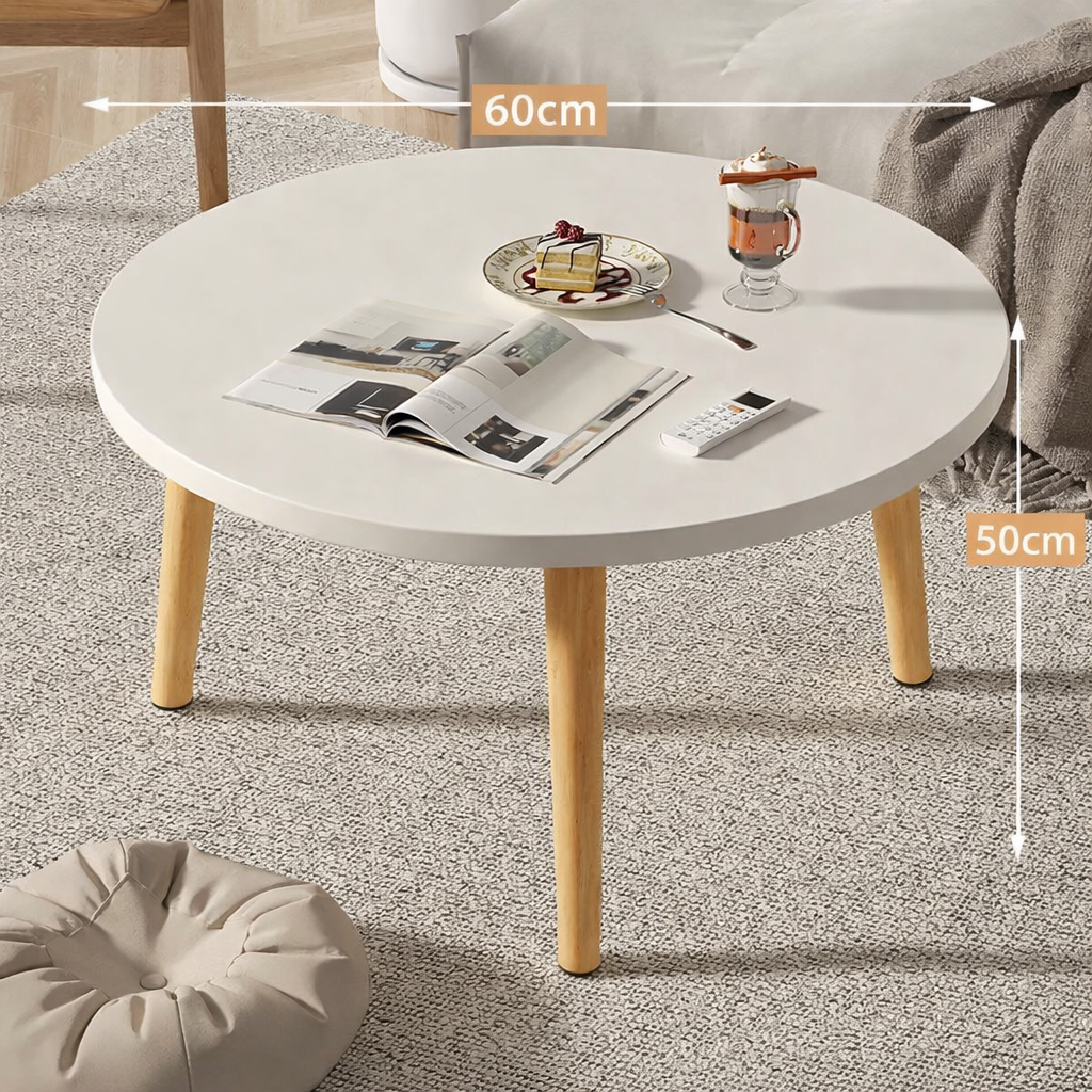 Table basse ronde en bois épurée pour petit salon