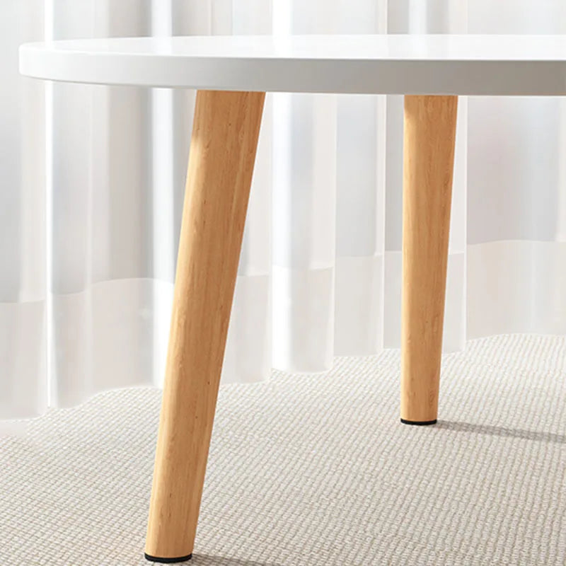 Table basse ronde en bois épurée pour petit salon