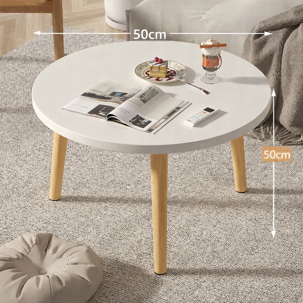 Table basse ronde en bois épurée pour petit salon