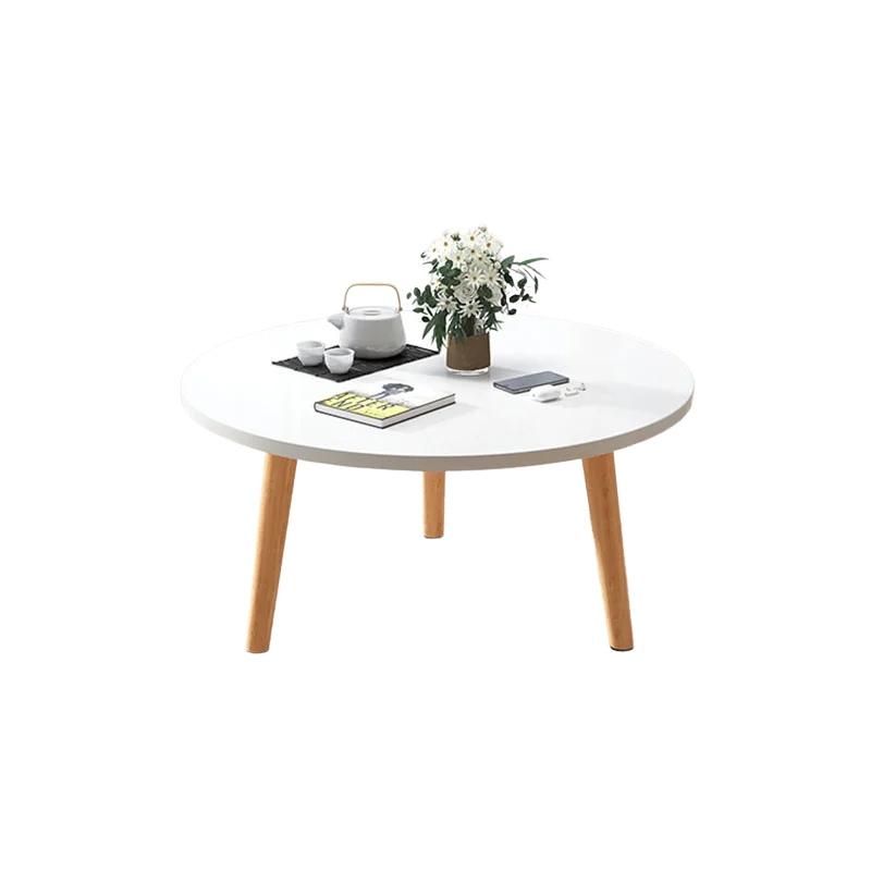 Table basse ronde en bois épurée pour petit salon