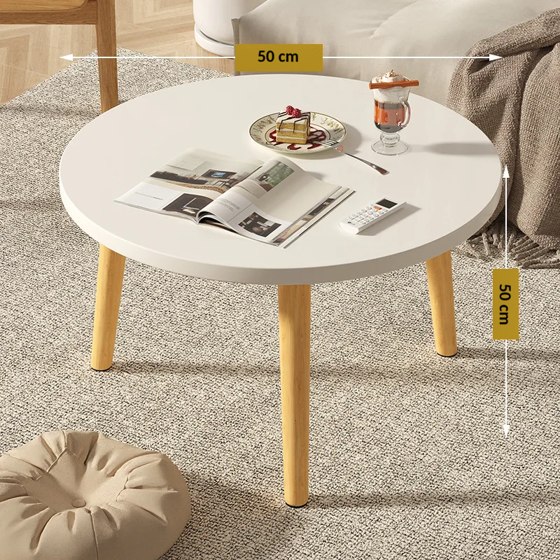 Table basse ronde en bois épurée pour petit salon