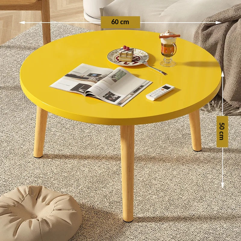 Table basse ronde en bois épurée pour petit salon
