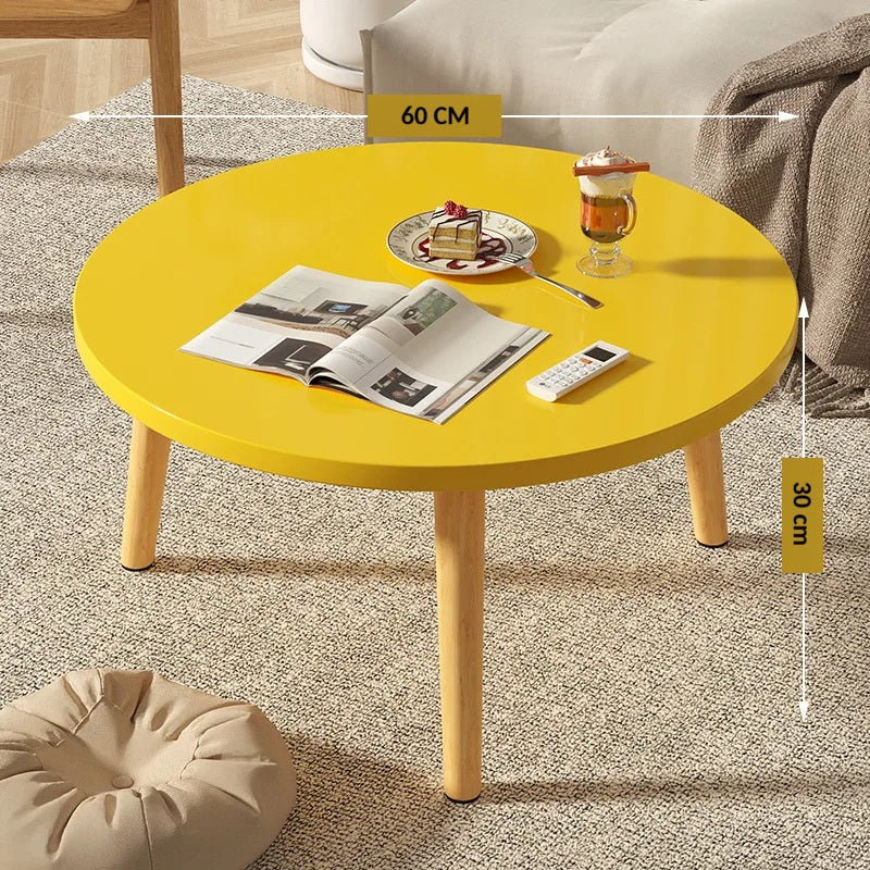 Table basse ronde en bois épurée pour petit salon